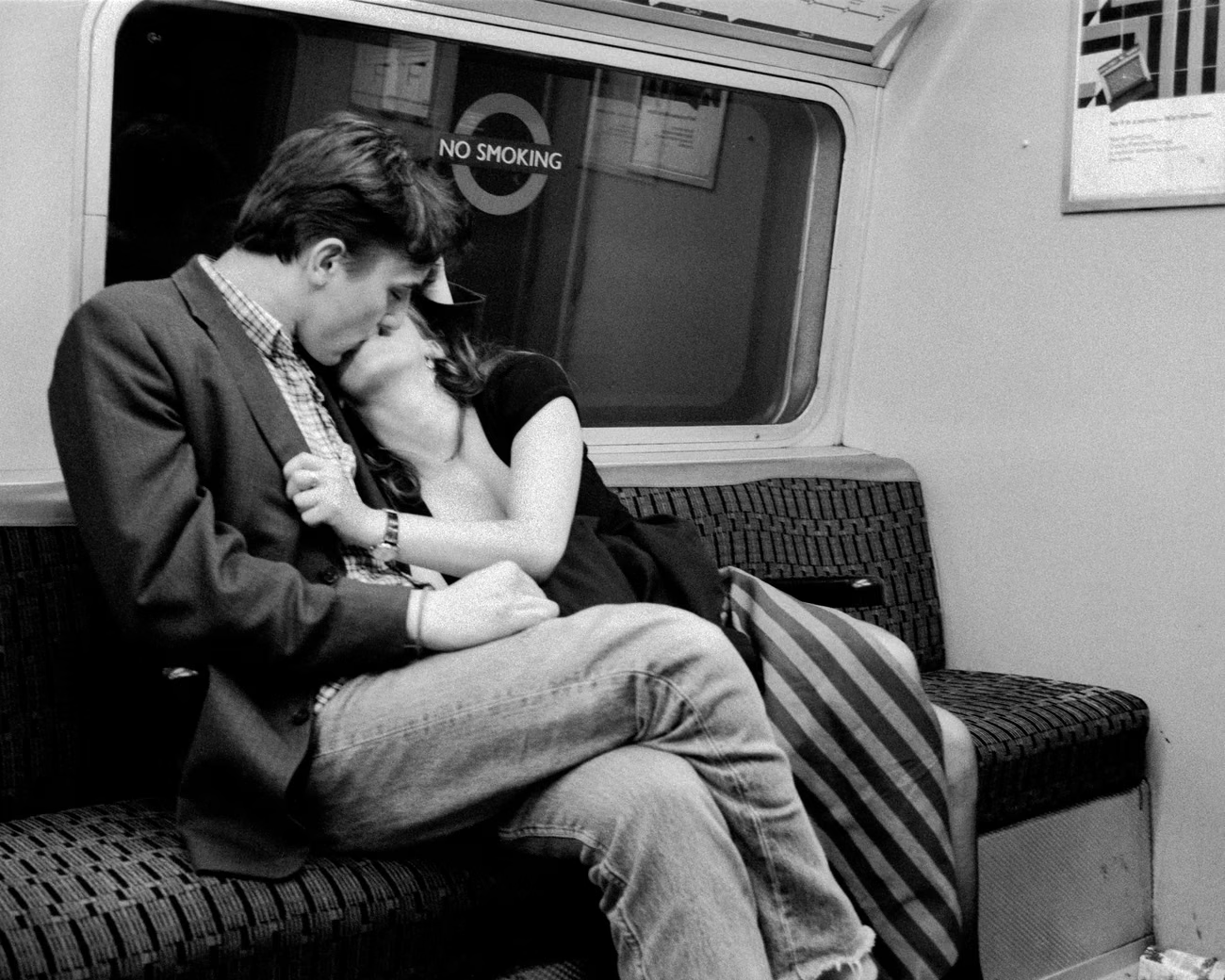 A couple on the Victoria line, 1993. Photograph: Mark McEvoy